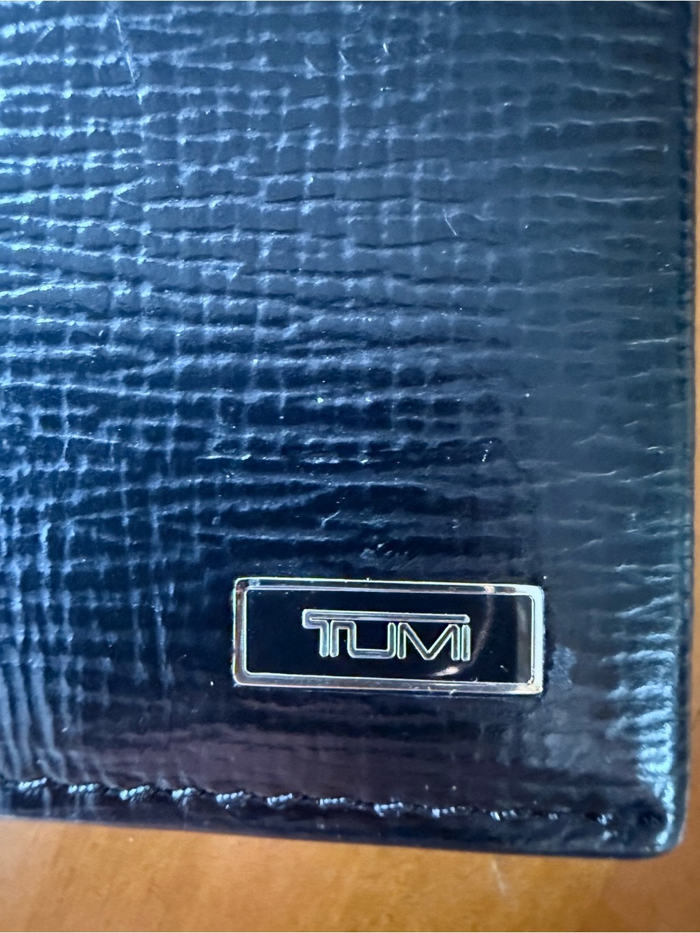 Tumi Black Textured Leather Bifold wallet Holder with Silver Logo